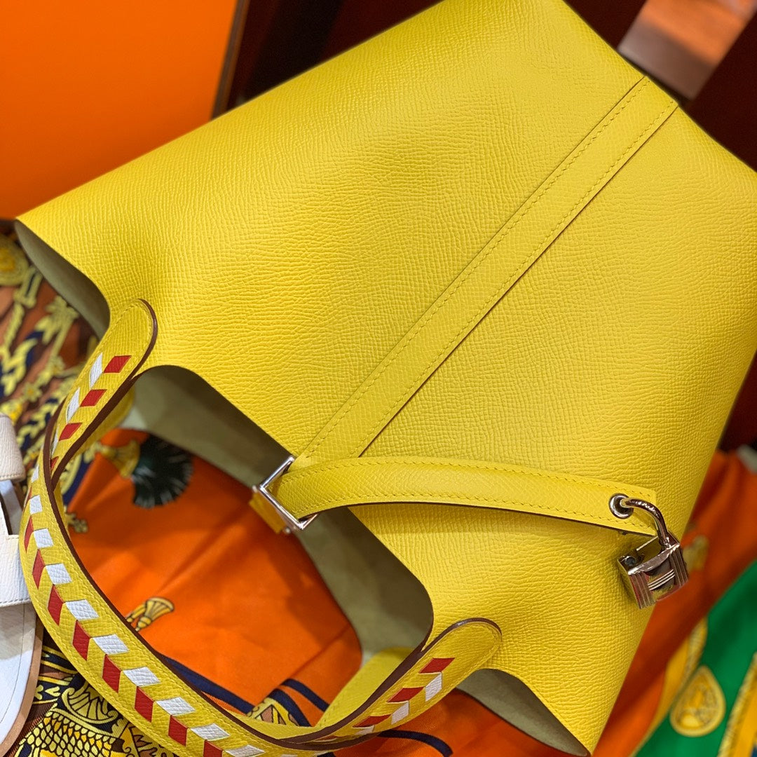 HM PICOTIN LOCK 18 LEMON EPSOM WITH BRAID STRAP