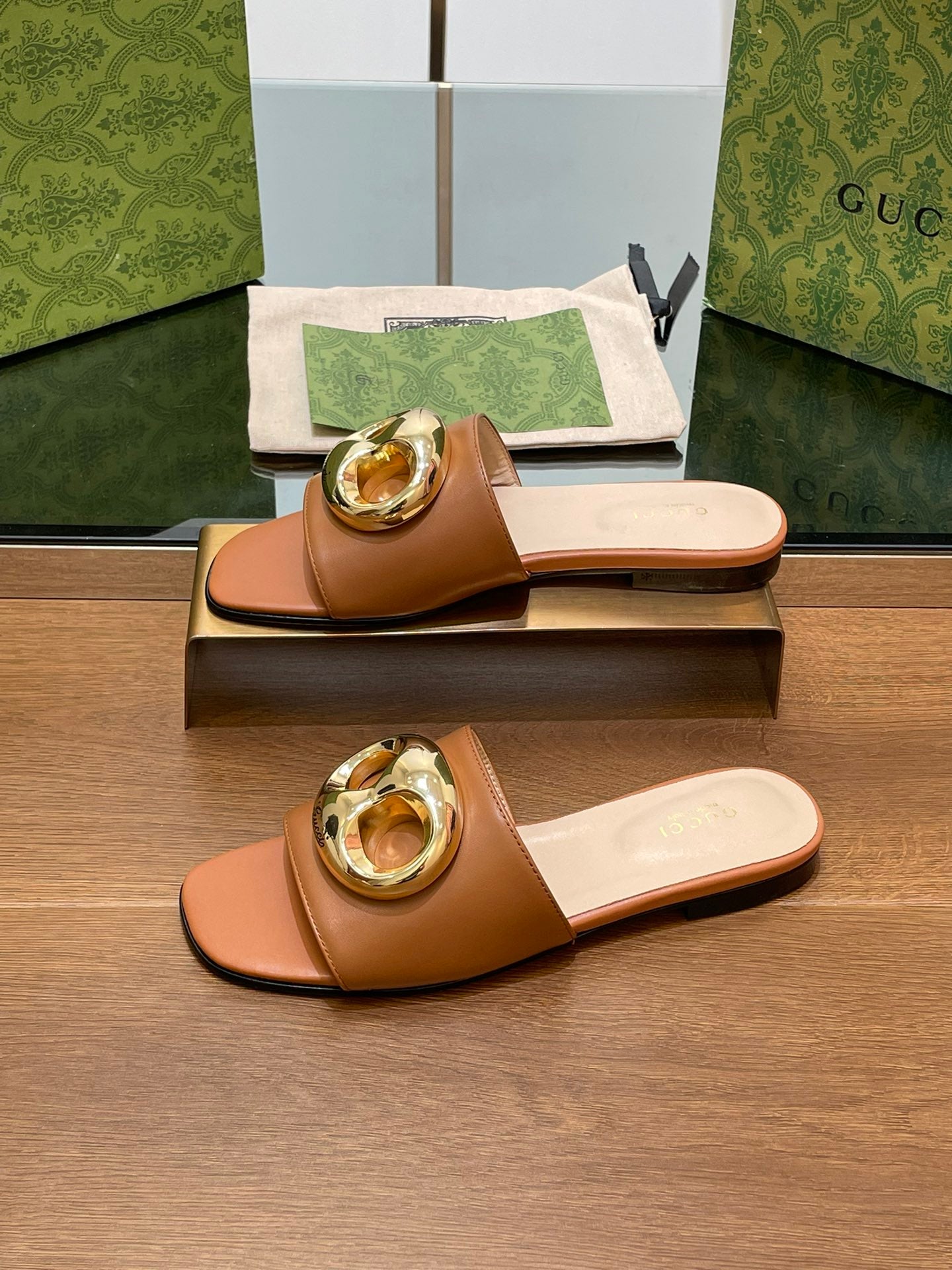 FLAT MULE IN BRONE BROWN CALFSKIN